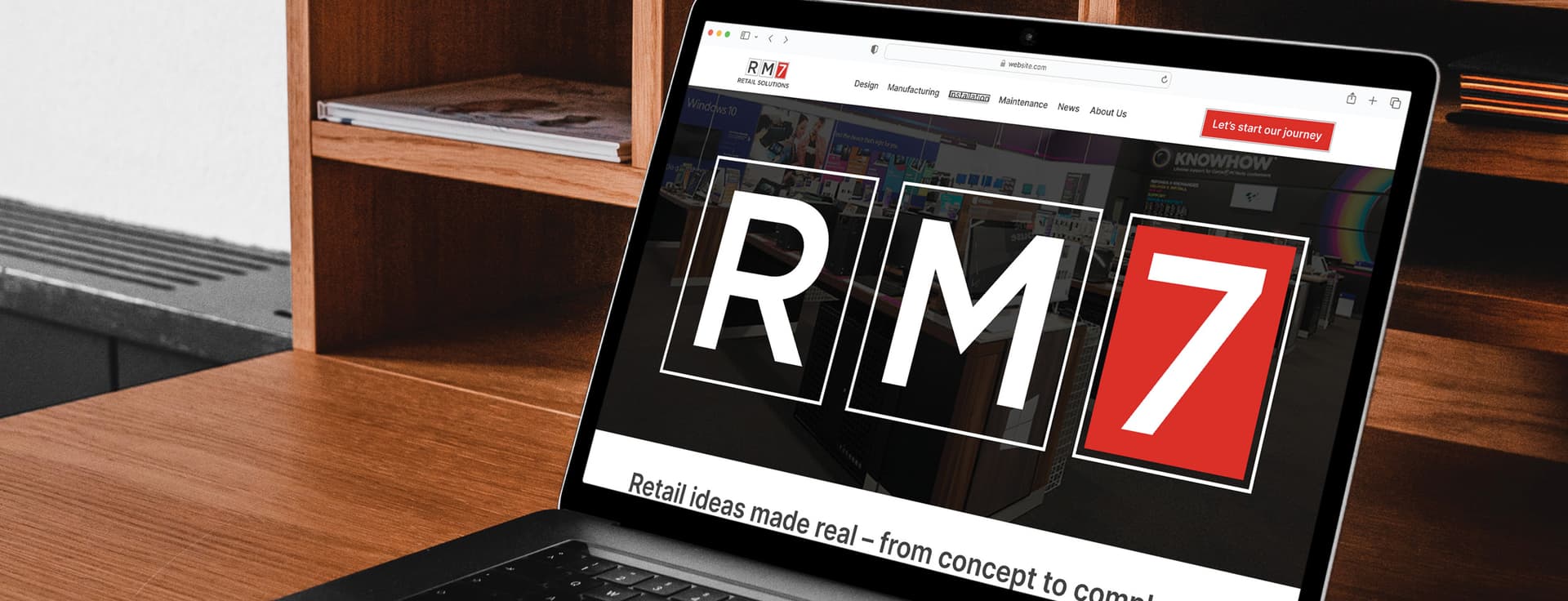 RM7_website_on_laptop